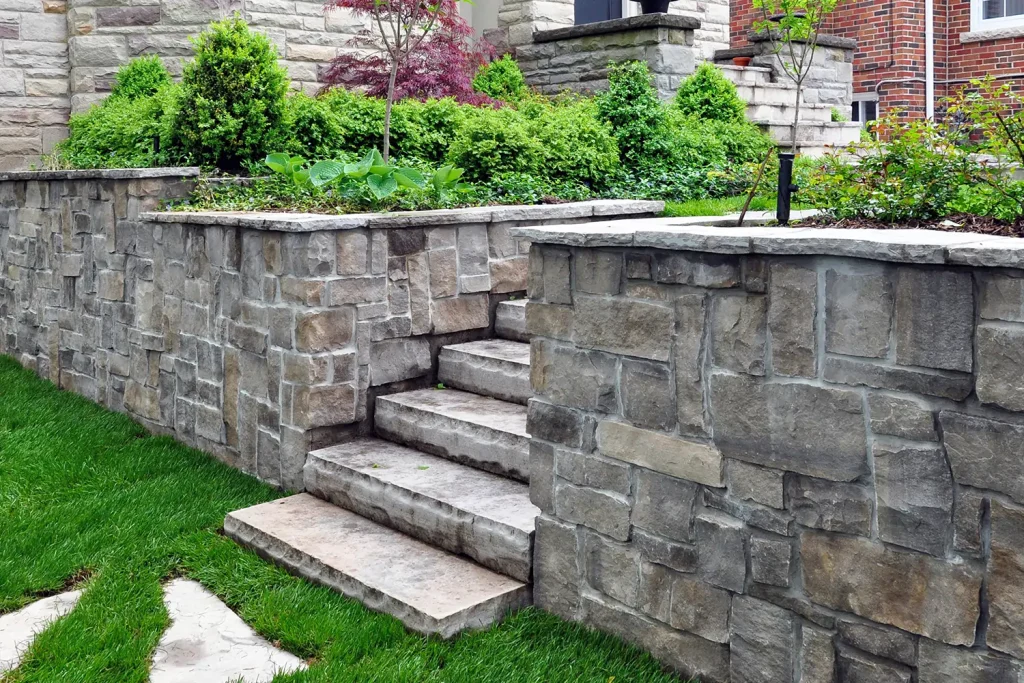 Retaining wall installation from Outdoor Scapes